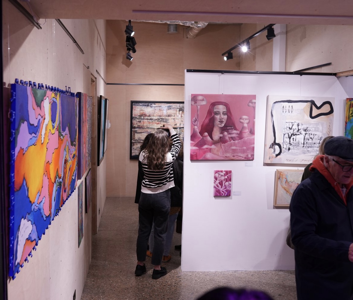 Gallery installation view featuring Renee Ng's pink figurative paintings